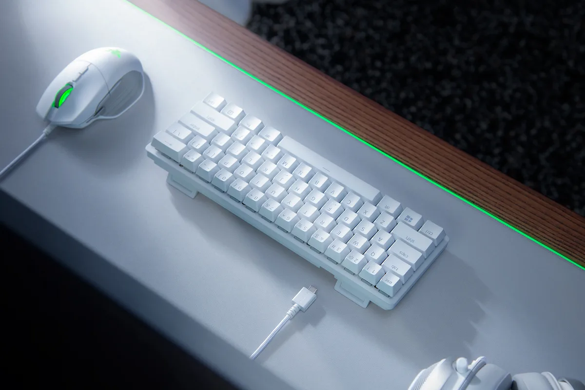 Razer Huntsman Mini Mercury — The detachable USB-C connection and side-printed functions are visible from the rear.